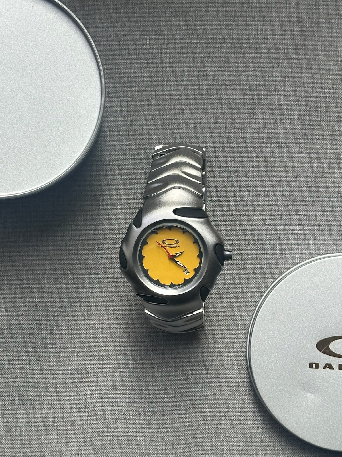 Oakley Blade Watch: Silver Brushed Stainless Steel with Yellow Dial, Swiss Movement
